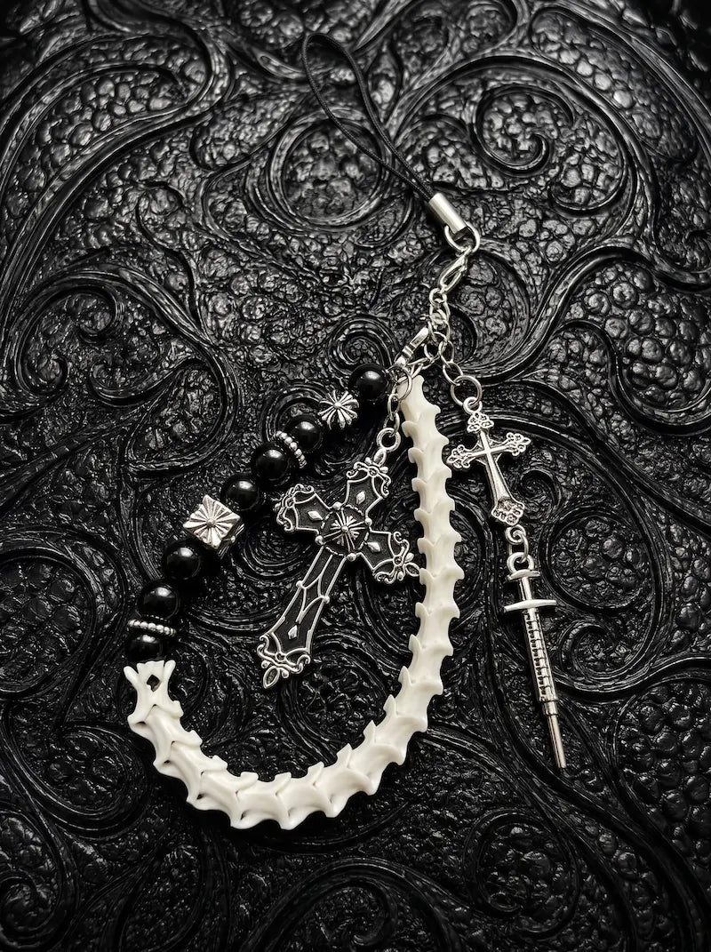 Cathedral Relic Snake Bone Keychain, loop of pale snake vertebrae with metal cross charms, dark beads and clip