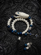 Cobalt Batwing Snake Bone Bracelet, pale preserved snake head and vertebrae bracelet with vivid cobalt-blue beads