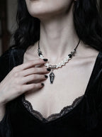 Coffin Oath Snake Bone Necklace, white vertebrae necklace with black accent beads and dark coffin-shaped pendant