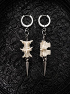 Gravechain Spike snake bone earrings showing front and side views of the vertebrae, chain links and pointed drops