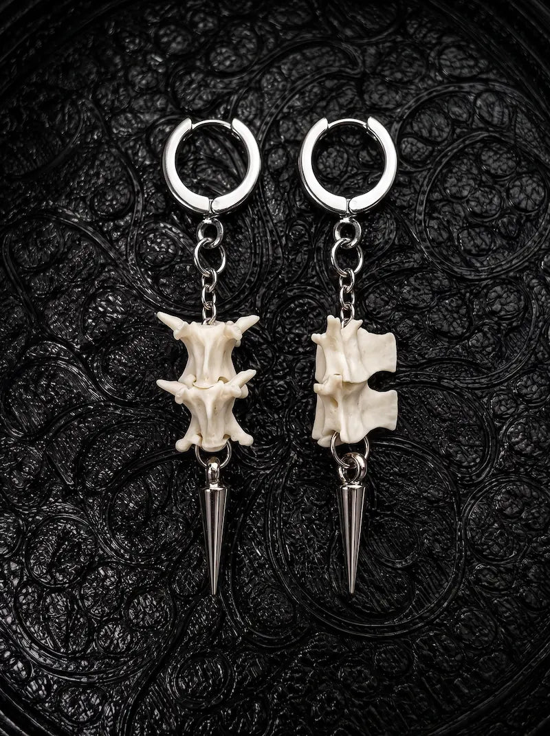 Gravechain Spike snake bone earrings showing front and side views of the vertebrae, chain links and pointed drops