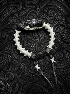 Kingshade Snake Bone Bracelet, white vertebrae bracelet with dark preserved snake head and hanging spear charms