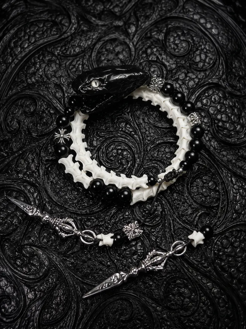 Nightreign Snake Bone Bracelet, white vertebrae bracelet with dark preserved snake head and dagger-shaped charms