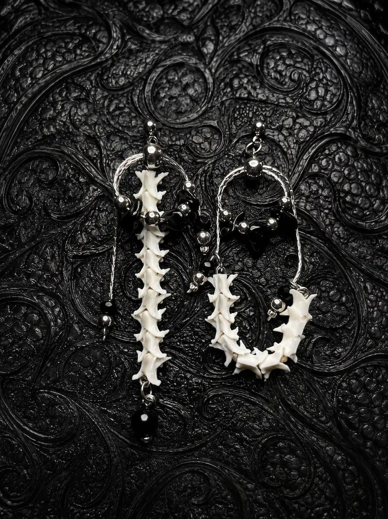 Nocturne Arc Snake Bone Earrings, asymmetric pale snake bone drop earrings with hoop details and dark dangling beads