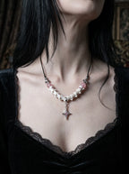 Roselight Snake Bone Necklace, white bone and pink bead necklace worn with a black lace camisole