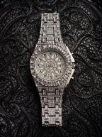 Solar Sigil Gothic Watch, engraved silver-tone metal watch with detailed silver dial, front view on black fabric