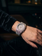 Solar Sigil Gothic Watch, silver Solar Sigil watch worn on a forearm with dark clothing and tattoos