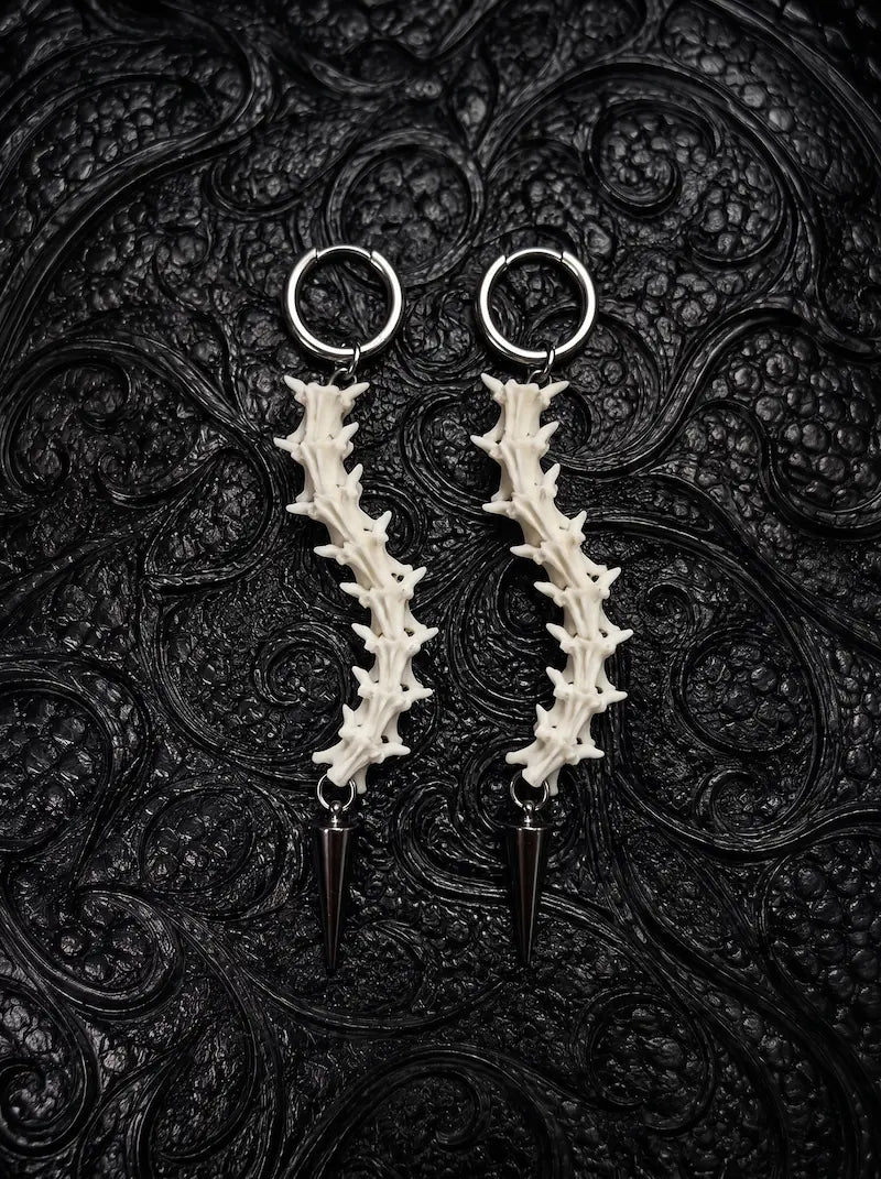 Spinepoint Snake Bone Earrings, pair of pale vertebrae drop earrings with pointed metal spear pendants