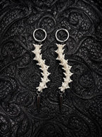 Spinepoint Snake Bone Earrings, pair of pale vertebrae drop earrings with pointed metal spear pendants
